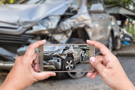 Picture of Smashed Car with Cell Phone