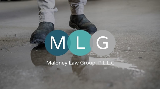 man stepping on puddle in warehouse